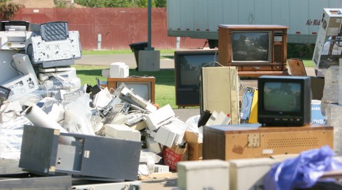 Workers sorting recyclable materials on a construction site